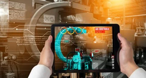 Engineer use augmented reality software in smart factory production line 스톡 사진