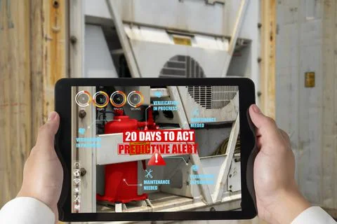 Engineer use augmented reality software in smart factory production line Foto stock
