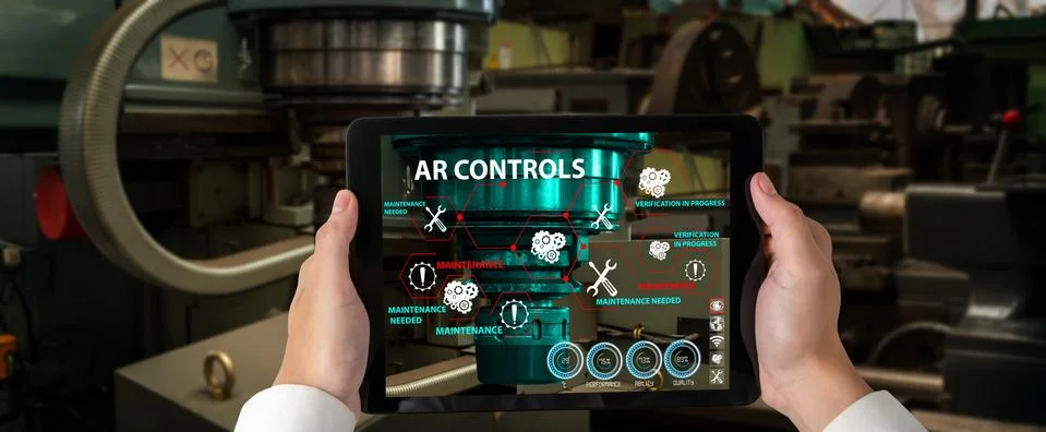 Engineer use augmented reality software in smart factory production line Stock Photos