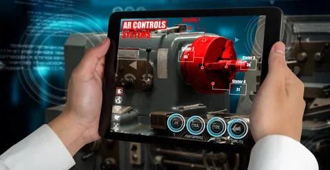 Engineer use augmented reality software in smart factory production line Foto stock