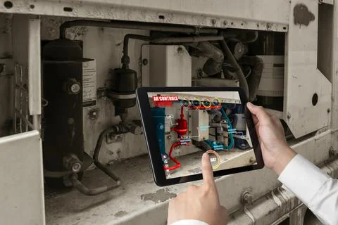Engineer use augmented reality software in smart factory production line 스톡 사진