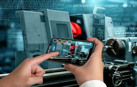 Engineer use augmented reality software in smart factory production line Stockfoto's