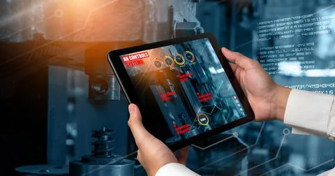 Engineer use augmented reality software in smart factory production line 스톡 사진