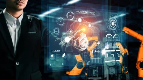 Engineer use cybernated robotic software control industry robot arm in factory 스톡 사진