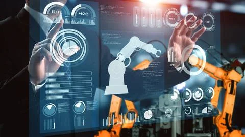 Engineer use cybernated robotic software control industry robot arm in factory Stock Photos