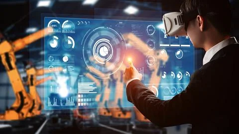 Engineer use cybernated robotic software control industry robot arm in factory Stock Photos