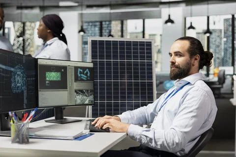 Engineer uses artificial intelligence to optimize solar panel fabrication Stock Photos