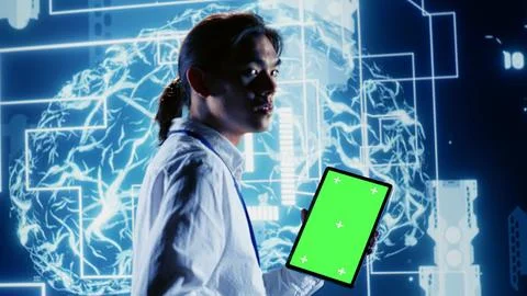 Engineer uses chroma key tablet for AI Stock Photos