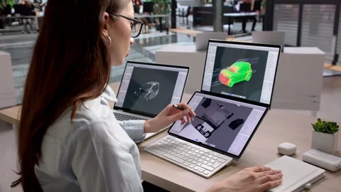 Engineer Uses Laptop To Design Stock Footage 335880265