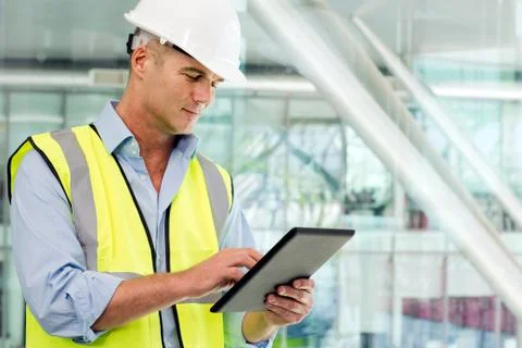 Engineer using digital tablet in office Stock Photos
