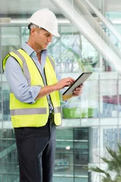 Engineer using digital tablet in office Stock Photos