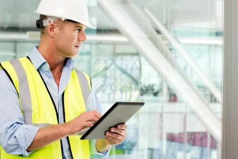 Engineer using digital tablet in office Stock Photos