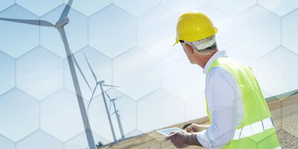 Engineer using digital tablet for wind turbine inspection, geometric pattern Stock Photos