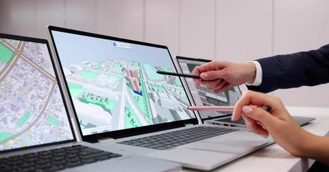 Engineer Using GIS Software For Real Estate Project Inspection. Stock Photos