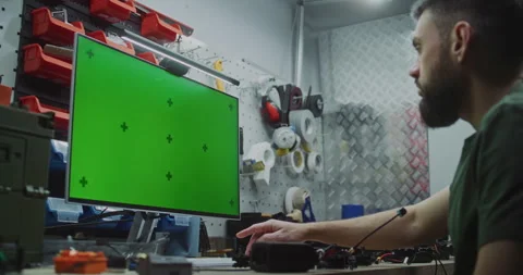 Engineer Using Green Screen For 3D Modeling And Design Software Stock Footage 322112462