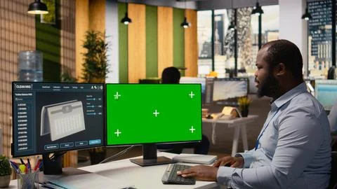 Engineer using green screen mockup PC to create advanced solar cell technology Stock Photos