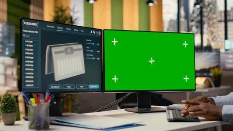 Engineer using green screen mockup PC to create advanced solar cell technology Stock Photos