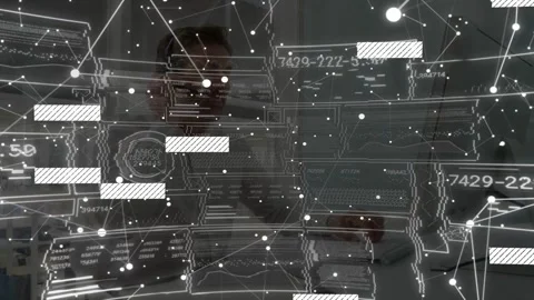 Engineer using keyboard behind schematic overlay, updating nodes, bars, numbers Stock Footage 333078426