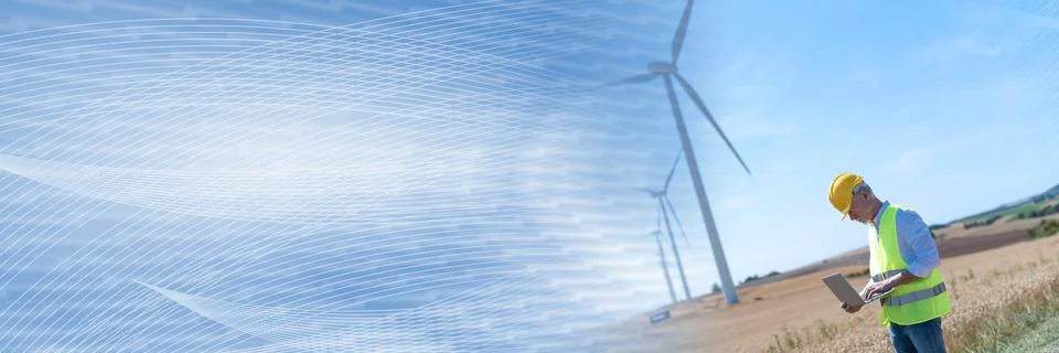 Engineer using laptop for wind turbine inspection; panoramic banner Stock Photos