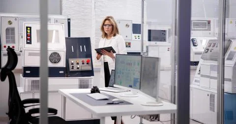 Engineer Using Medical Tablet in the Industry Factory Stock Photos