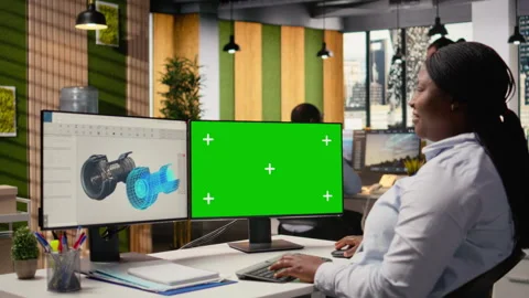 Engineer using mockup computer to reduce carbon footprint of wind turbines Stock Footage 316002679