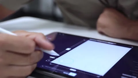 Engineer using tablet to draw 3 dimensional object Видео 205196178