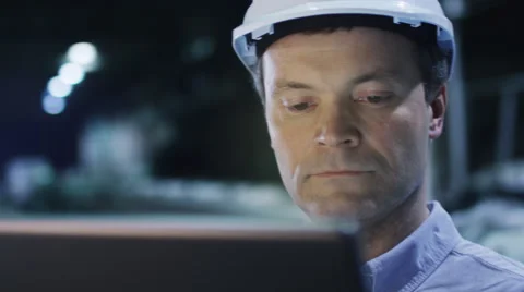 Engineer in Using Tablet in Factory Stock Footage 47900092