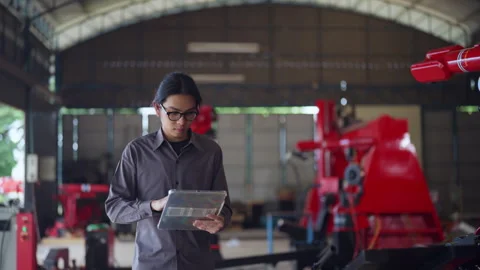 Engineer Using Tablet in Industrial Warehouse Stock Footage 282519988