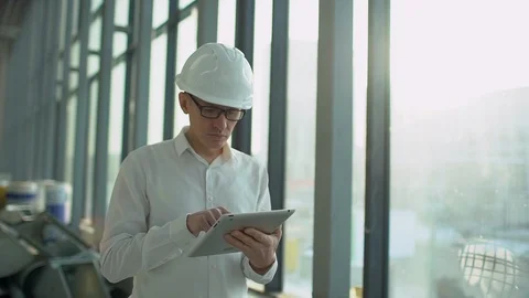 Engineer is Using Tablet PC in Factory. slow-motion Stock Footage 85909452