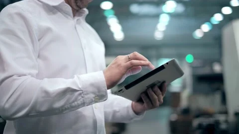 Engineer Is Using Tablet Pc In Factory. Slow-Motion. Stock Footage 172014475