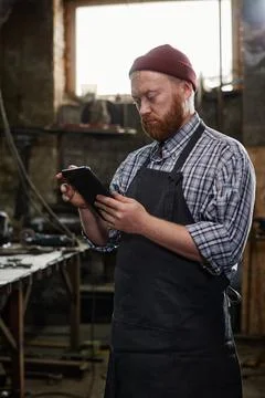 Engineer using tablet pc at work Stock Photos