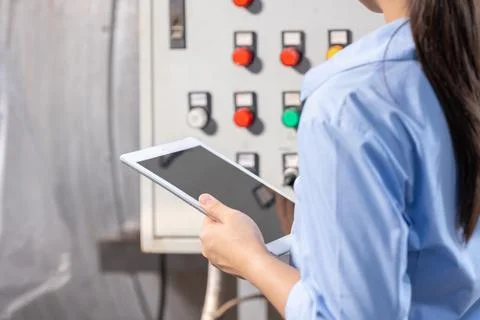 Engineer using Tablet software check service maintenance electricity main c.. 스톡 사진