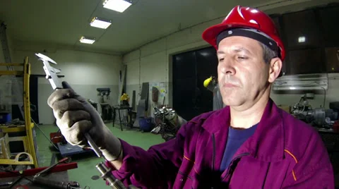 Engineer Using Vernier Caliper Stock Footage 39395312
