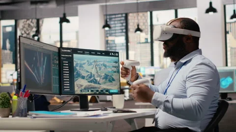 Engineer using virtual reality simulation to do clean energy technology testing Stock Footage 315617617