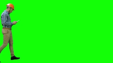 Engineer using a wireless tablet to check construction project on a Green Screen 스톡 동영상 71205326