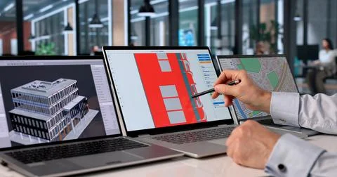 Engineer Views 3D Digital Twin Model On Laptop For Urban Project Management. 写真素材