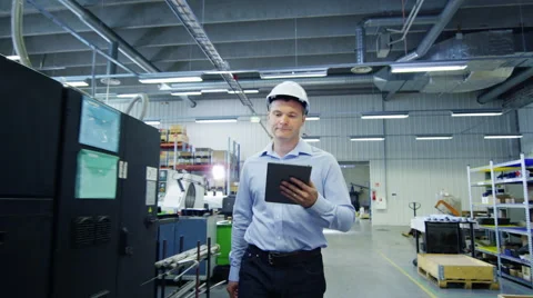 Engineer is Walking Through Factory and Have Handshake with Worker. Stock Footage 52273136