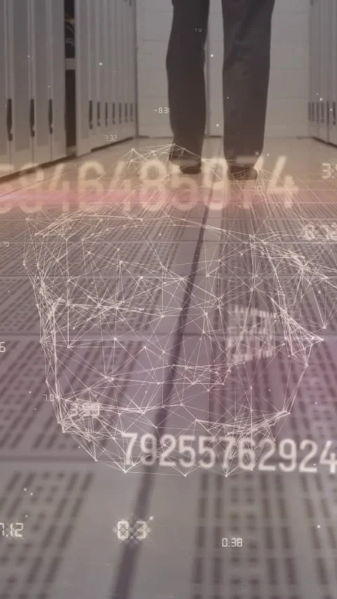 Engineer walks in server room, symbolizing cyber security and data storage tech. Stock Footage 323151206
