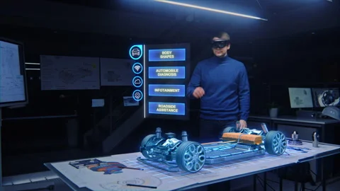 Engineer Wearing Augmented Reality Headset Builds 3D Car Video stock 137565253