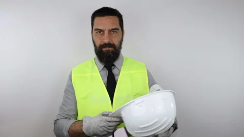 Engineer wearing hard hat putting crossing arms smiling looking at the camera. Stock Footage 152626889