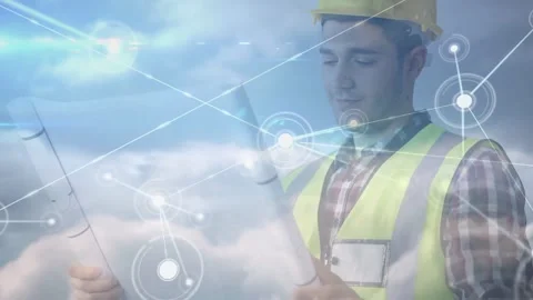Engineer wearing hi-vis vest studying plans, HUD spreading across clouds, Stockbeeldmateriaal 332275943