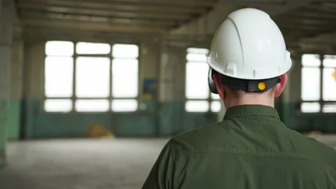 An engineer wearing virtual reality glasses moves digital objects with his hands Stock Footage 152756398