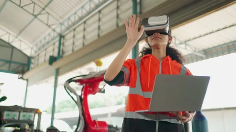 Engineer wearing VR and looking at model Stock Footage 171280648