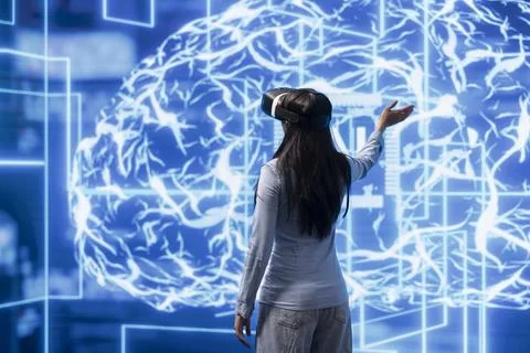 Engineer wearing VR headset, working with artificial intelligence neural 스톡 사진