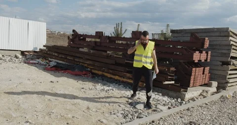 An engineer who walks the construction site Stock Footage 127055022