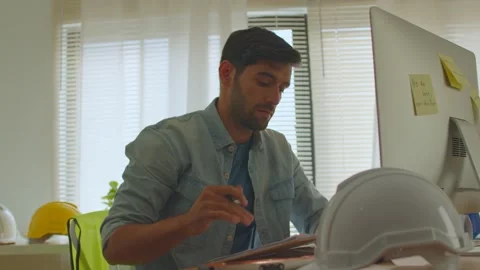 Engineer work in office in front of computer Stock Footage 146680234