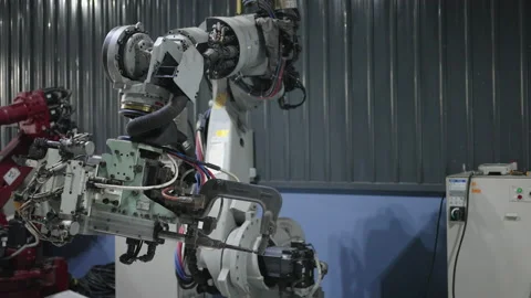 Engineer work at robotic arm factory. Stock Footage 239699174
