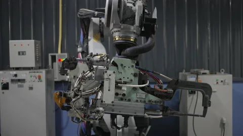 Engineer work at robotic arm factory. Stock Footage 239699214