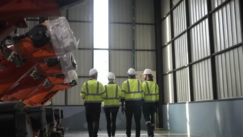 Engineer work at robotic arm factory. Stockbeeldmateriaal 239699246