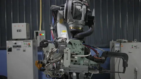 Engineer work at robotic arm factory. Stock Footage 239699319